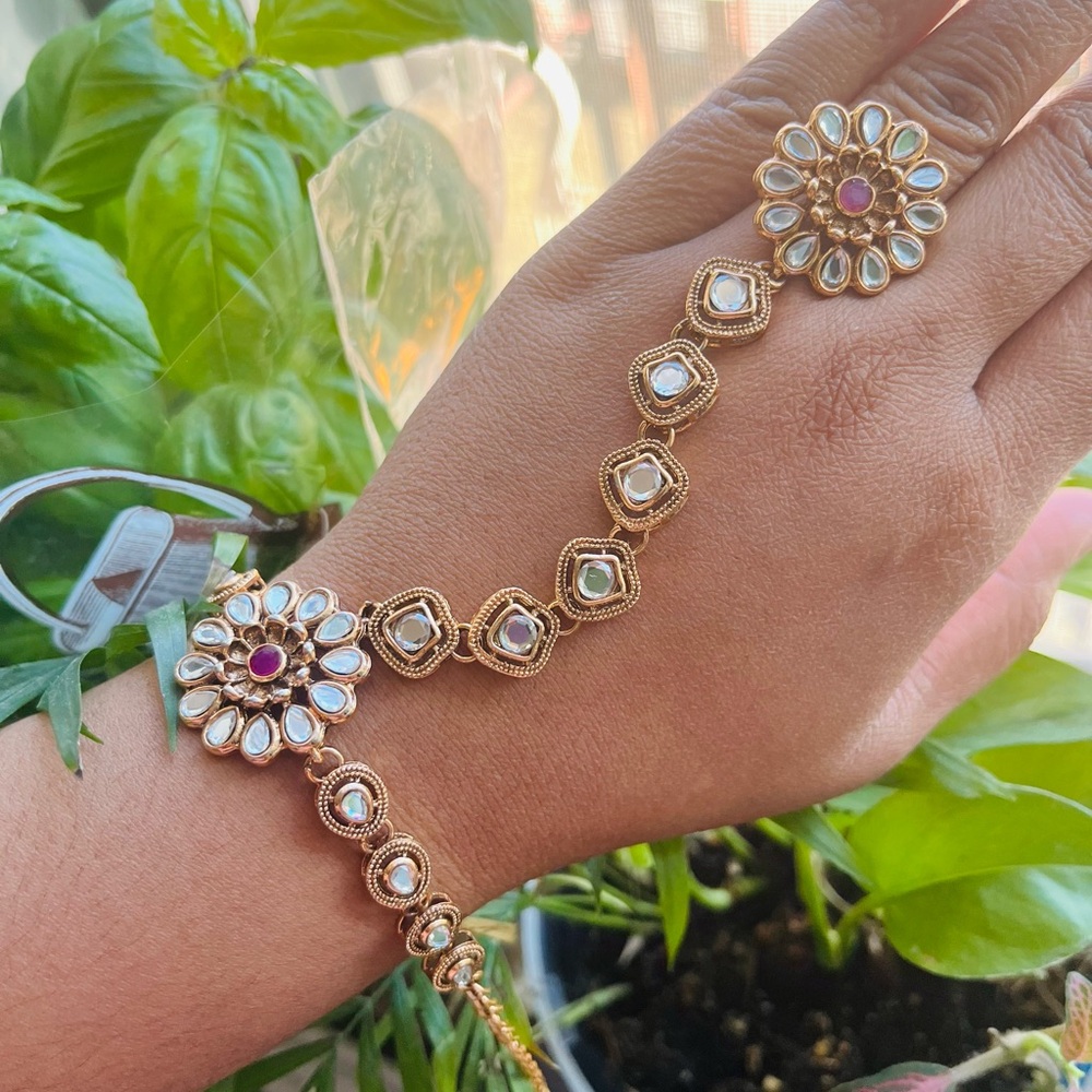 White kundan,Ornate Gold, and Red Bracelet with Floral Design a set (2 pieces)